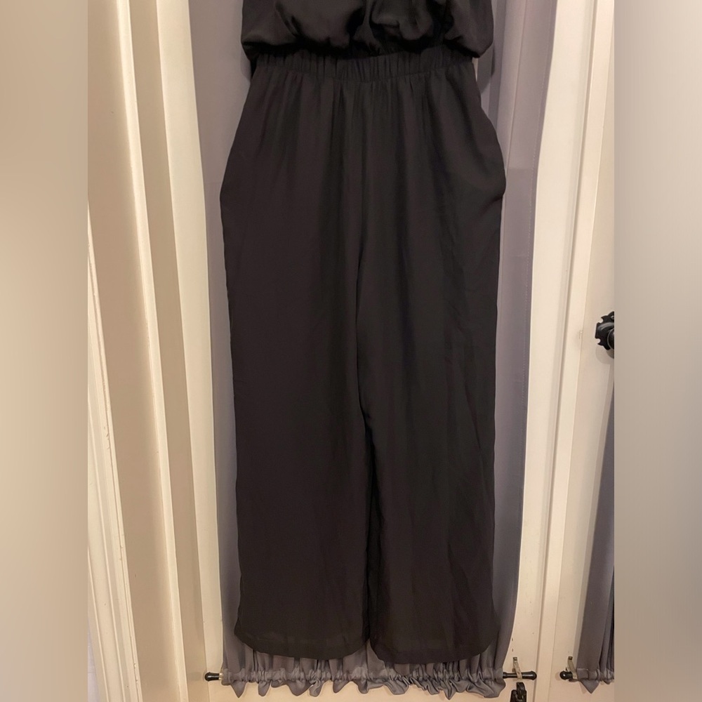 Halter Sleeveless Jumpsuit with Wide Legs and Pockets in Black - Picture 3 of 11